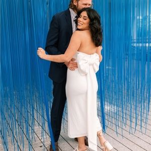 White dress with bow in back